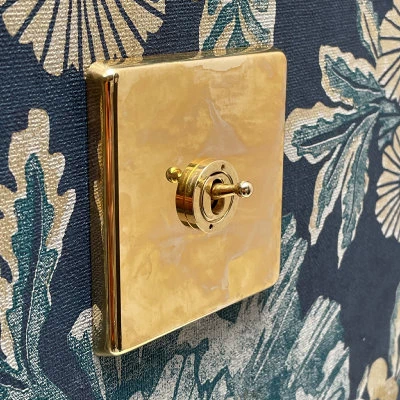 Grandura Unlacquered Brass Intermediate Toggle (Dolly) Switch