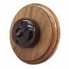 1 Brown Dome Switch on Round Wooden Pattress