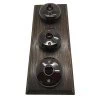 3 Brown Dome Switches on Vertical Wooden Pattress