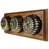 3 Fluted Antique Brass Dome Switches on Horizontal Wooden Pattress