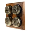 4 Fluted Antique Brass Dome Switches on Square Wooden Pattress