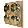 4 Polished Brass Dome Switches on Square Wooden Pattress