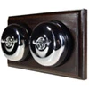 2 Polished Chrome Dome Switches on Horizontal Wooden Pattress