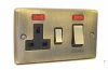 Double Plate - Used for cooker circuit. Switches both live and neutral poles also has a single 13 AmpMP socket with switch : Black Trim Warwick Antique Brass Cooker Control (45 Amp Double Pole Switch and 13 Amp Socket)