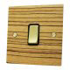 See Flat Wood Veneer Zebrano | Polished Brass sockets and switches range